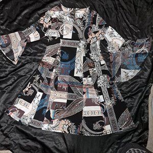 Flare-Bottom Mid length dress with flare sleeve.  Multicolored.